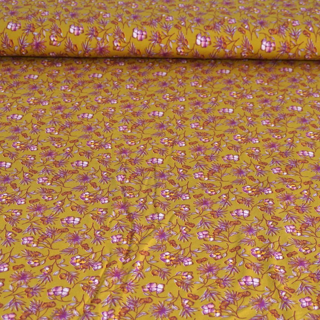 Modaljersey Blümchen violett auf senfgelb